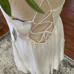 Abercrombie sundress. Adorable crisscross back in white with Swiss dot.